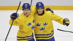 Hokejisté Švédska se radují po vítězství nad Finskem z postupu do finále olympijského turnaje v Soči. (Švédsko - Finsko)