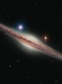 Černá díra HLX-1 na okraji galaxie ESO 243-49 (ilustrace; HLX-1 je světlý namodralý bod)