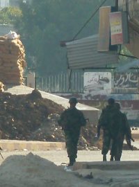 Vládní vojáci v syrském městě Homs