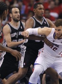 Los Angeles Clippers  power forward Blake Griffin (32) is guarded by San Antonio Spurs small forward Kawhi Leonard (2), Manu Ginobili (20) and Boris Diaw (33) during Game 4 of their NBA Western Conference semi-final playoff basketball game in Los Angeles